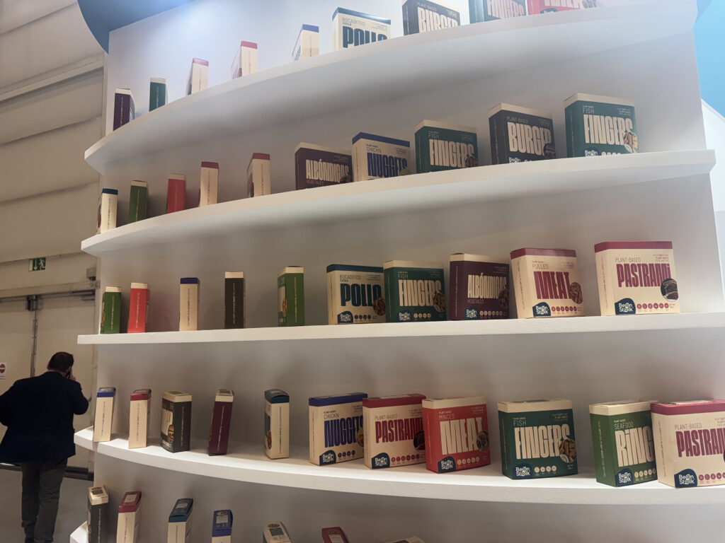 Shelves of plant-based meal options by BeanStalk at AIX 2025