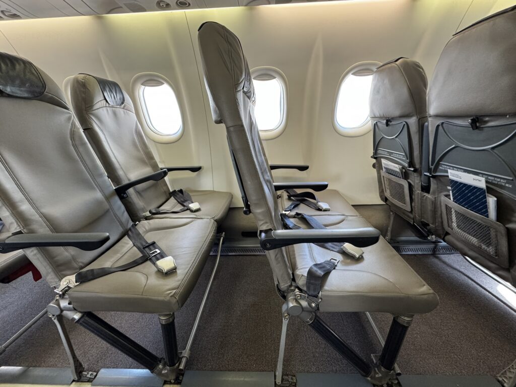 Side view of the bare bones seats on board the Q400.