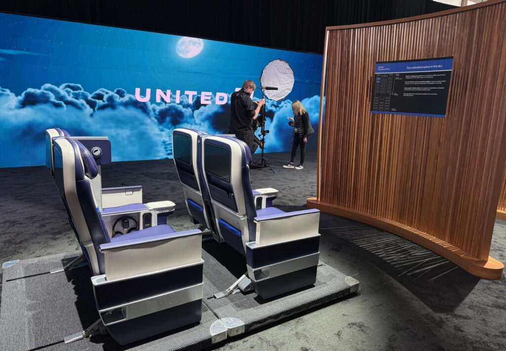 Side view of premium economy seats with seatback IFE, as part of the Elevated mockup shown in New York