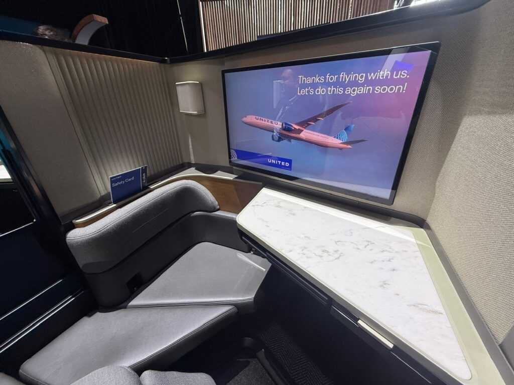 Massive IFE screen in Polaris Studio, which also enables a companion to join the passenger in the suite.