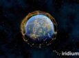 A rendering of the earth with Iridium satellite network lines depicted above it. Iridium logo is to the bottom right of the image. Enhanced Short Burst Data ESBD