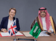 H.E. Abdulaziz Al-Duailej, President of GACA, and Dr. Rannia Leontaridi, Director General for Aviation, Maritime, and Security at the UK Department for Transport, sign the agreement.