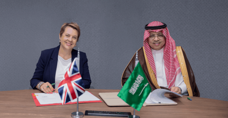 H.E. Abdulaziz Al-Duailej, President of GACA, and Dr. Rannia Leontaridi, Director General for Aviation, Maritime, and Security at the UK Department for Transport, sign the agreement.
