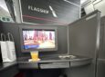 Inside seat 1D, a Flagship Preferred suite on the American Airlines 787-9P. An IFE screen is in view, as is the word Flagship on the monument in front.