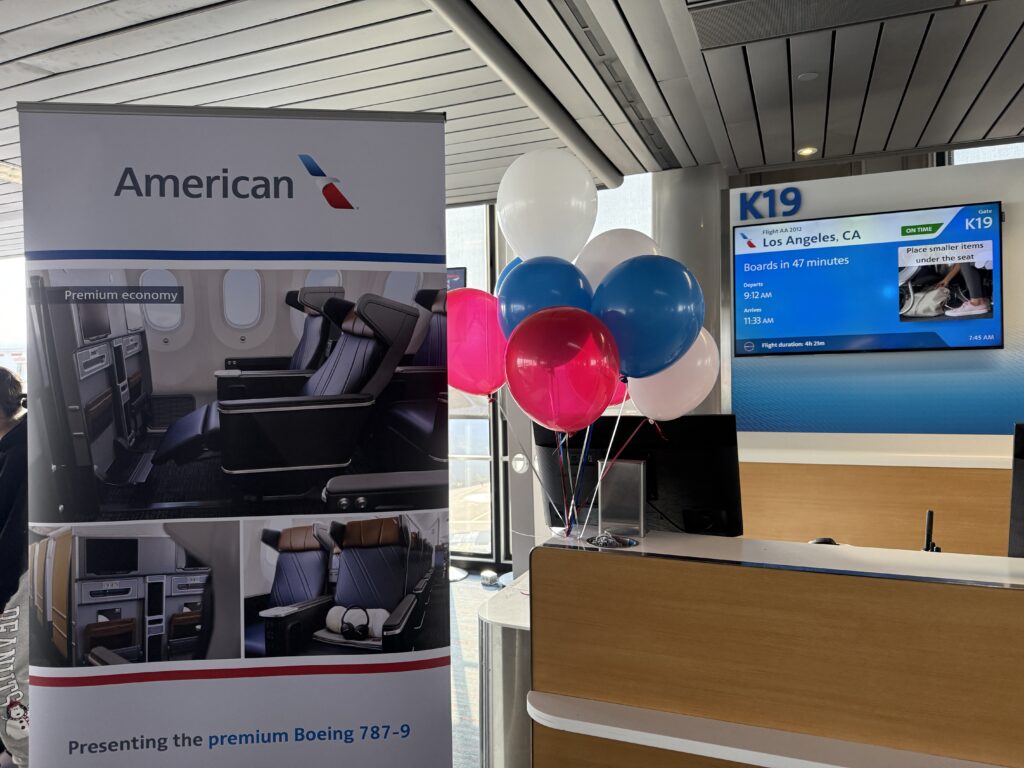 Gate K19 at Chicago O’Hare: balloons and signage celebrate the inaugural 