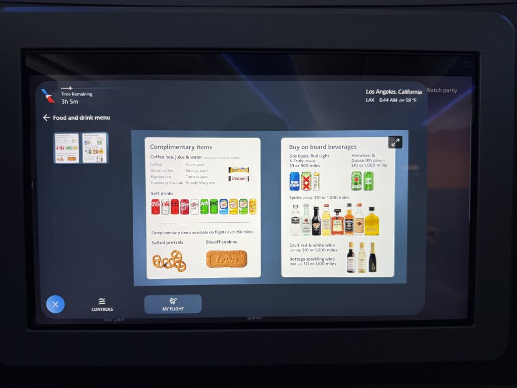 Inflight beverage options are displayed on the embedded IFE