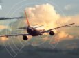 An aircraft is flying into the sunset with a Gilat logo in the top left corner