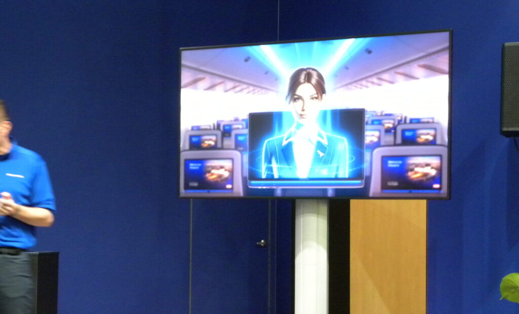 A virtual assistant is shown on a large screen, demonstrating the power of Converix