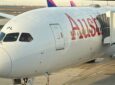 Austrian Airlines 787-9 parked at the gate on a sunny day in Vienna