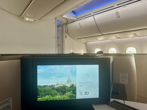 Large IFE screen is in view. So too are the deep overhead bins on the Austrian 787