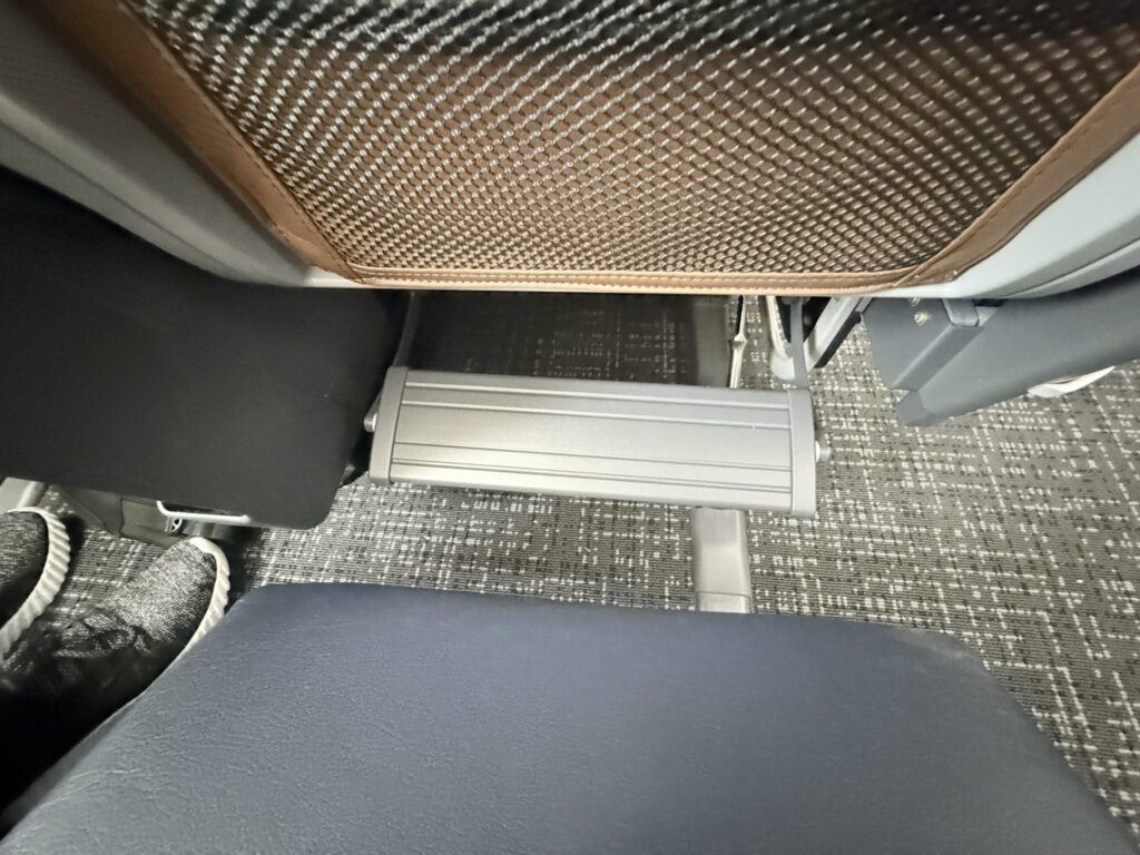 Looking down at both the calf rest and footrest. 