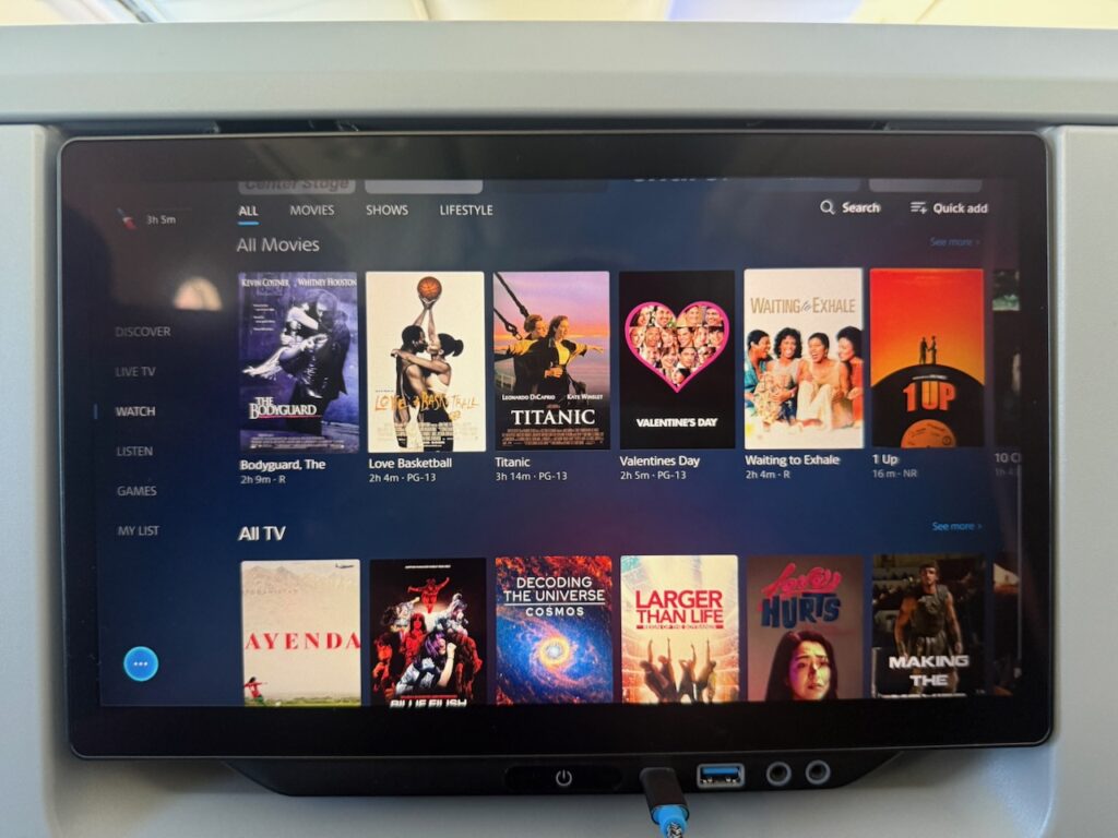 Vast movie catalogue is on offer. Various movie titles are shown on the screen.