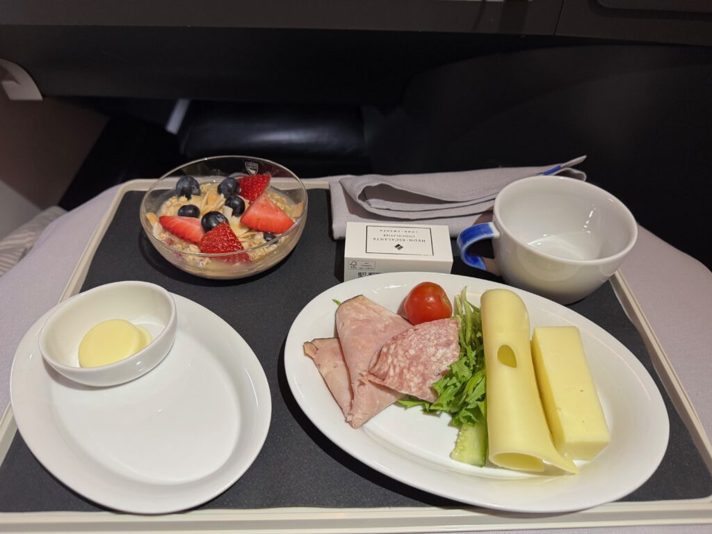 Cheese, meat and a bowl of muesli. 