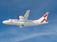 Rendering of ATR turboprop in JSX livery in-flight