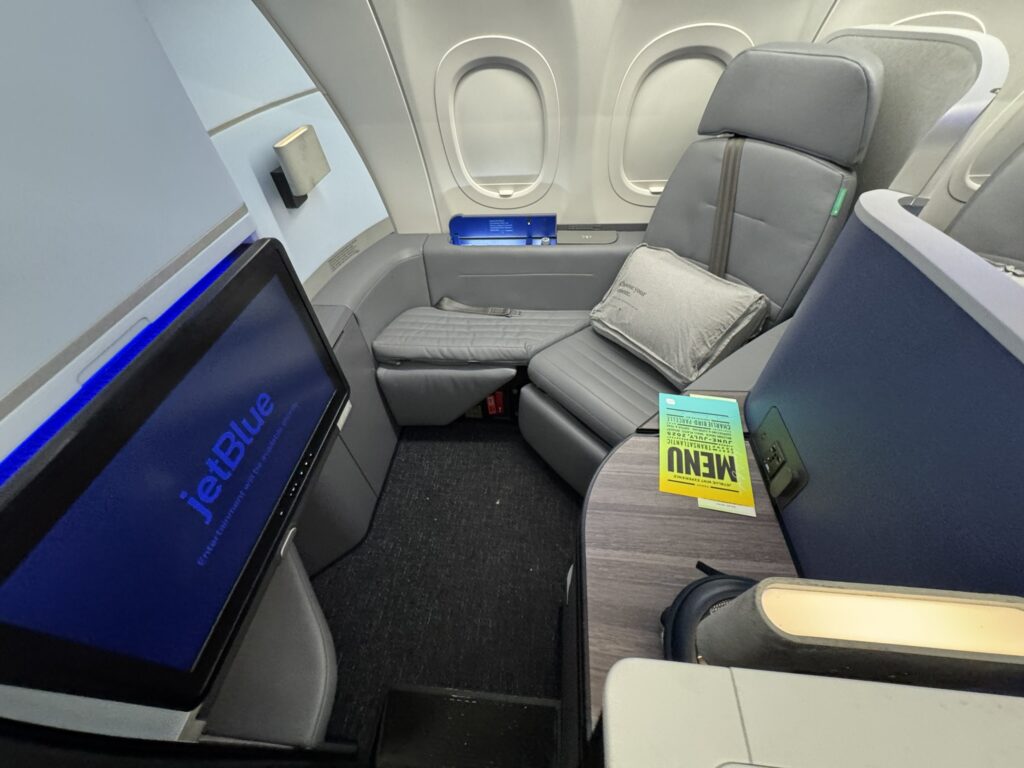 JetBlue Mint Studio with Vantage Solo seat, large IFE screen, and plenty of storage