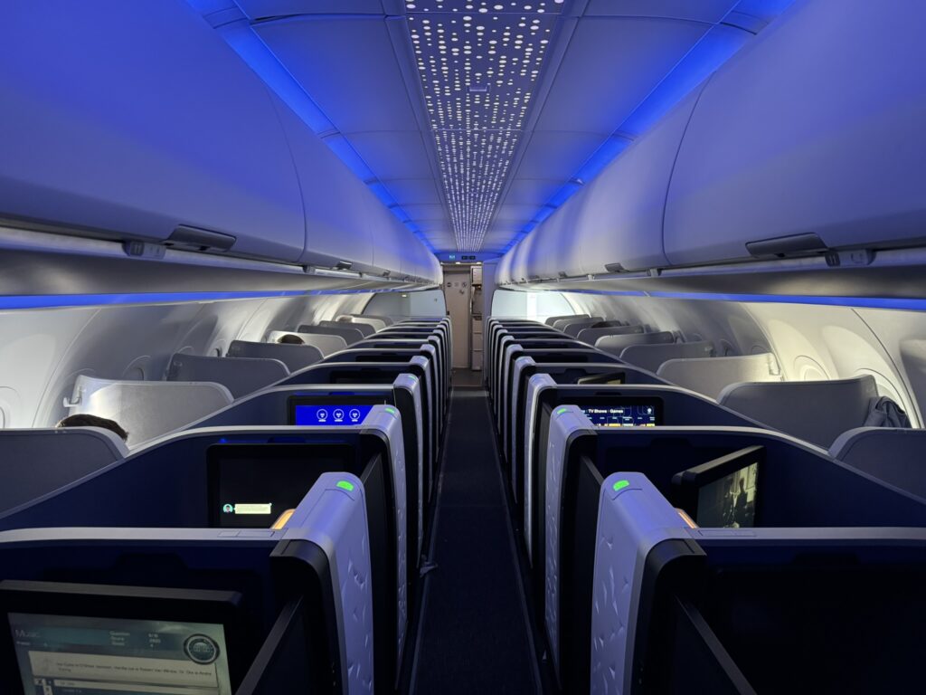 View of the cabin with spectacular blue LED lighting and Airspace signature ceiling