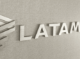 LATAM branding in silver on a monument