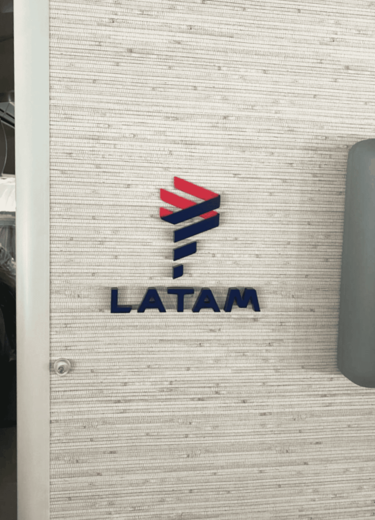 LATAM branding in red and blue on a monument