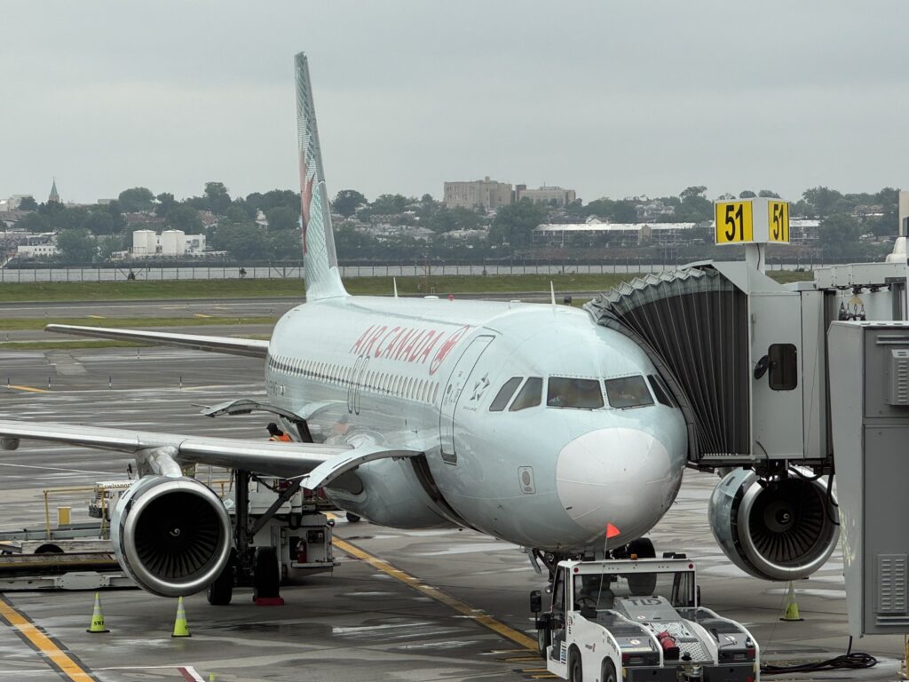 Air Canada A320 parked at the gate and ready to board.