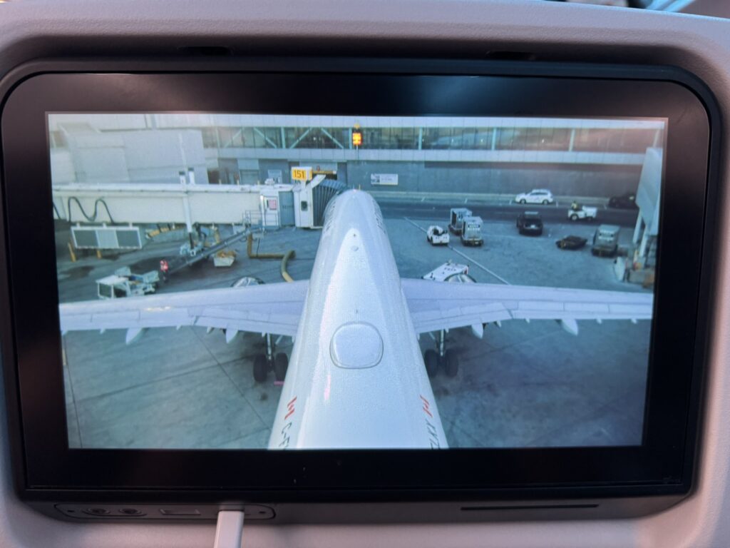 Cameras installed in the tail show the aircraft is parked at the gate.