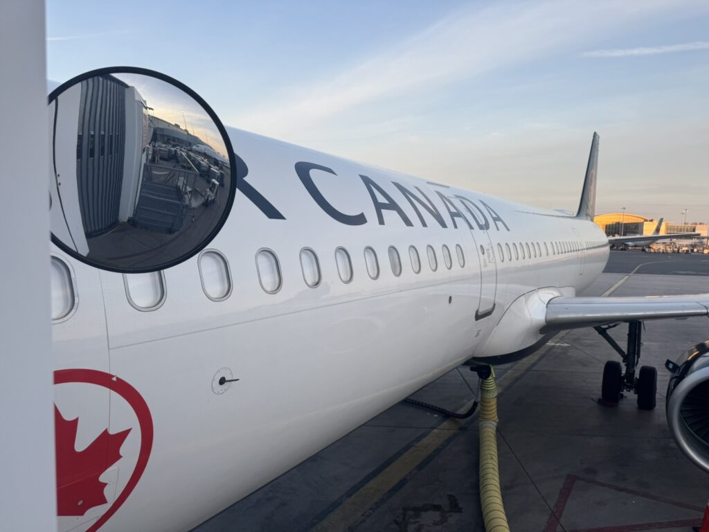 Air Canada A321 at the gate for boarding. 
