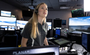 Embry-Riddle student Hailee Williamson, who is earning her bachelor’s degree in Air Traffic Management, trains in the university’s Tower Lab. (Photo: Embry-Riddle/Bill Fredette-Huffman)