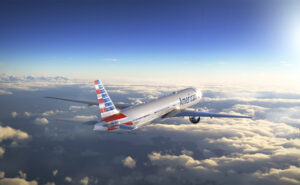 American Airlines aircraft inflight above the clouds