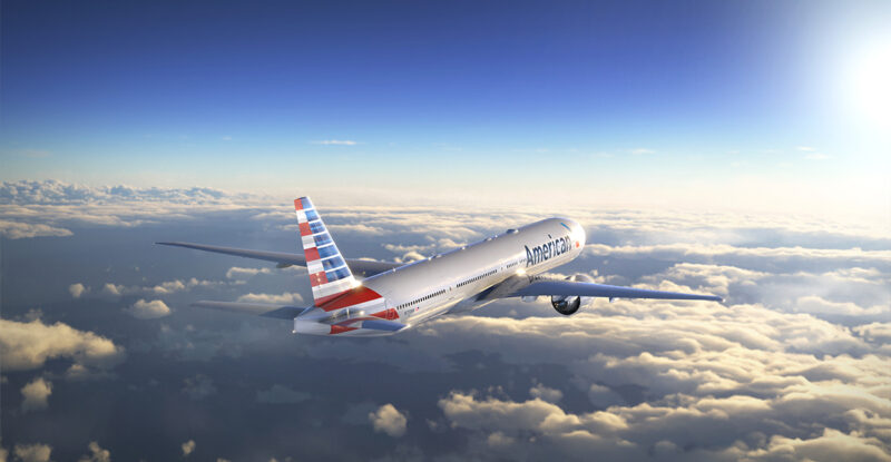 American Airlines aircraft inflight above the clouds