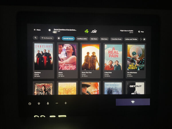 Aer Lingus IFE content options are displayed on the seatback screen