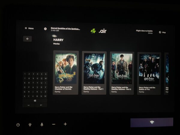 Aer Lingus IFE content options are displayed on the seatback screen