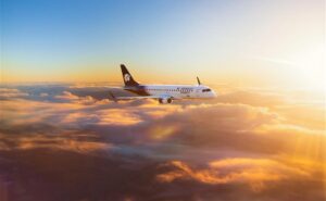 Rendering of Aeromexico Embraer E190 in flight at sunset