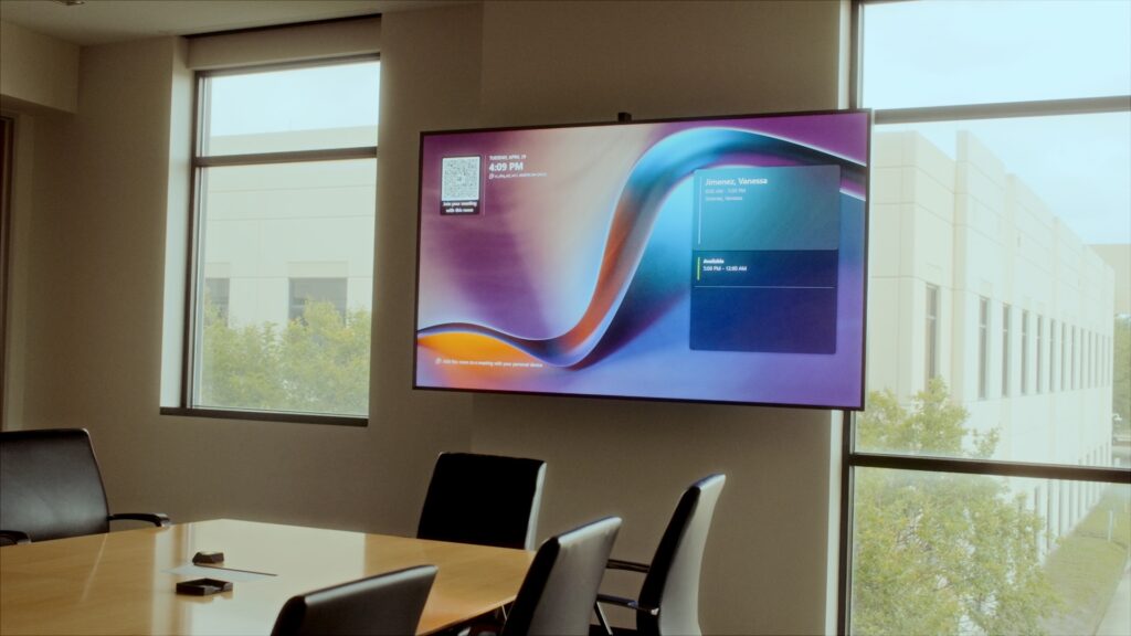 Giant Samsung display in a conference room.