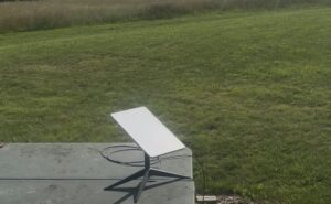 Starlink phased array antenna in a rural setting.