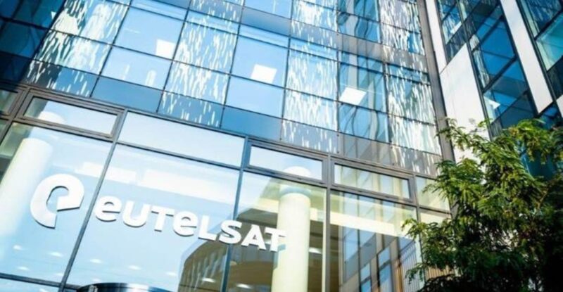 Eutelsat headquarters. The office features tall windows and Eutelsat's name in white letters.