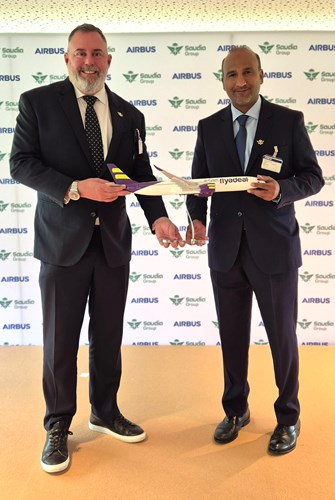 flyadeal CEO Steven Greenway with Airbus executive celebrating to order of Airbus A330neos