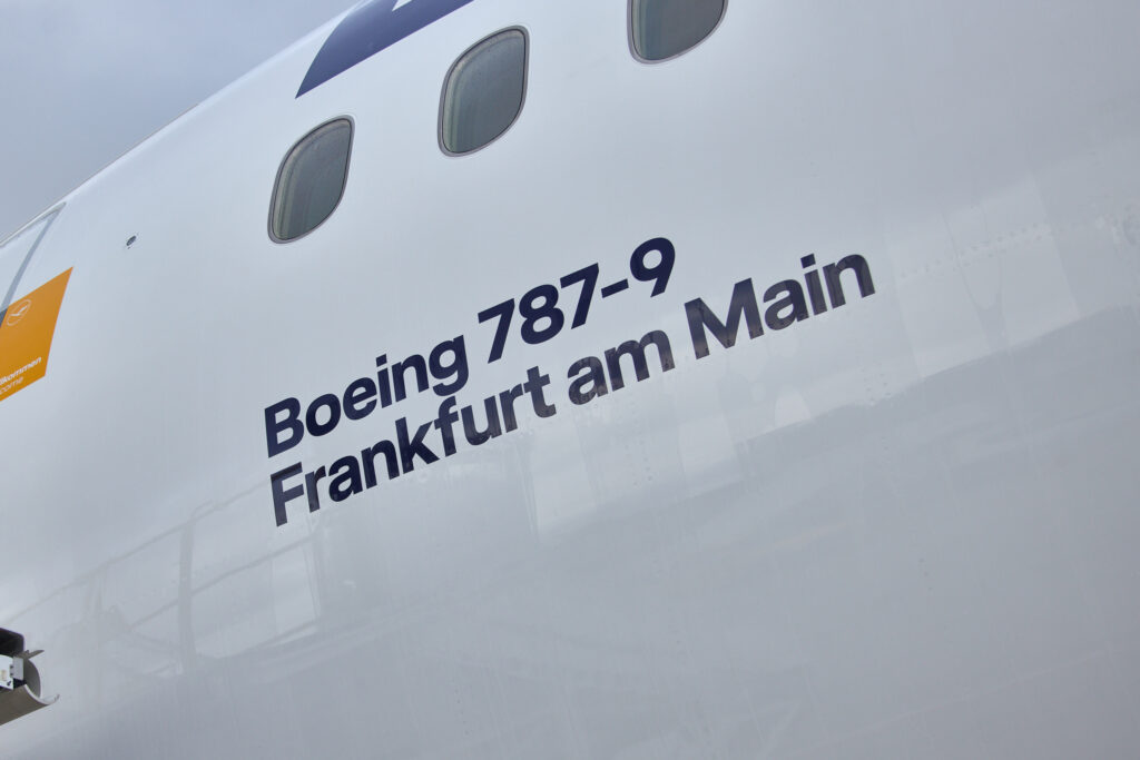 Close up of the words "Boeing 787-9 Frankfurt am Main" on the side of the Lufthansa 787-9 fitted with Allegris