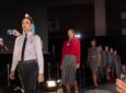 Avianca uniforms on models who are walking on the runway