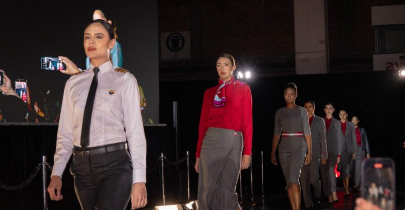 Avianca uniforms on models who are walking on the runway