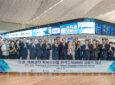 Korean and Delta execs celebrate remote baggage screening pact