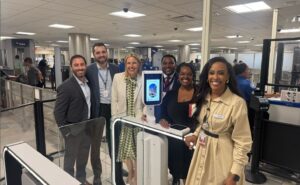 ATL new eGates. Employees celebrate the milestone.