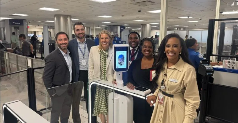 ATL new eGates. Employees celebrate the milestone.