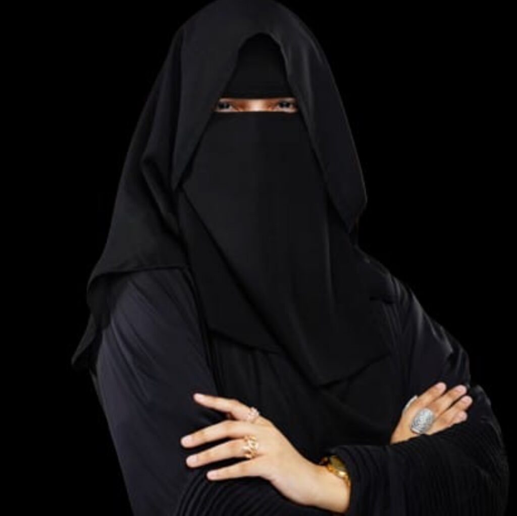 Captain Qadar Sarfraz in a black niqab on a black background
