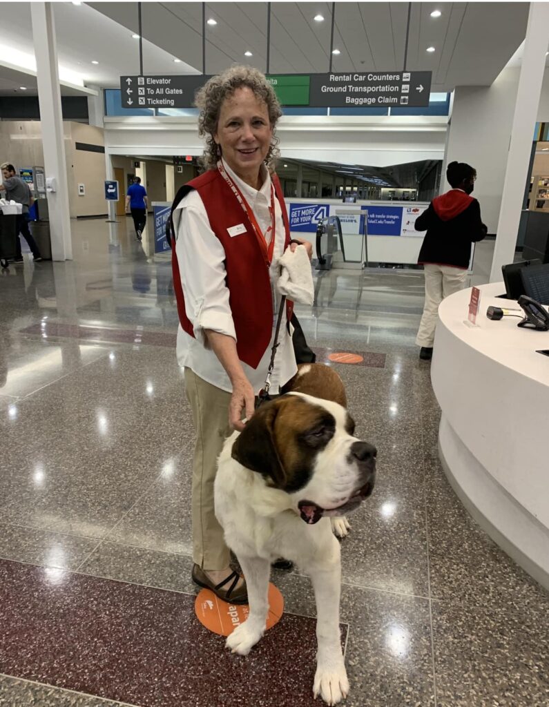 Welcome Waggin Therapy Dog  with a volunteer