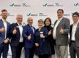 HAECO and Liebherr-Aerospace execs celebrate new MRO pact