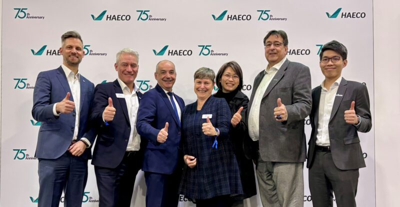 HAECO and Liebherr-Aerospace execs celebrate new MRO pact