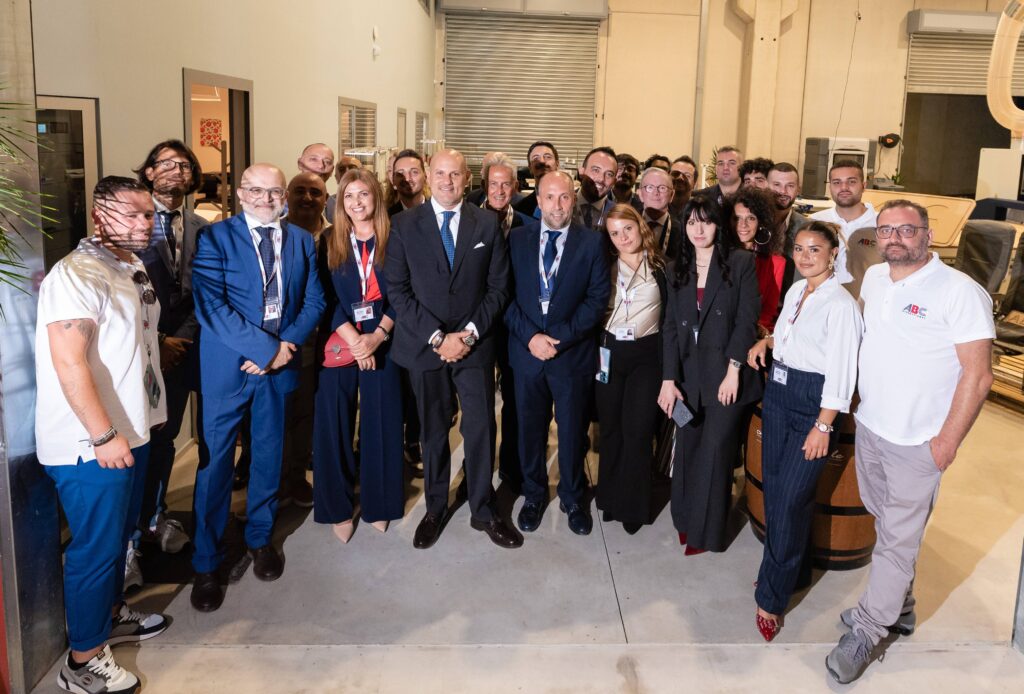 ABC International team all posing for a photo at the new facility