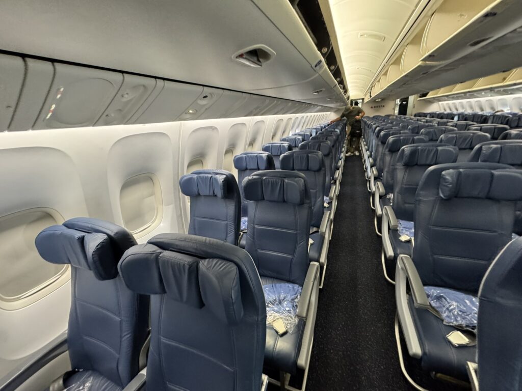 Inside the Delta Boeing 767-400ER economy class cabin. The cabin is empty at this time.
