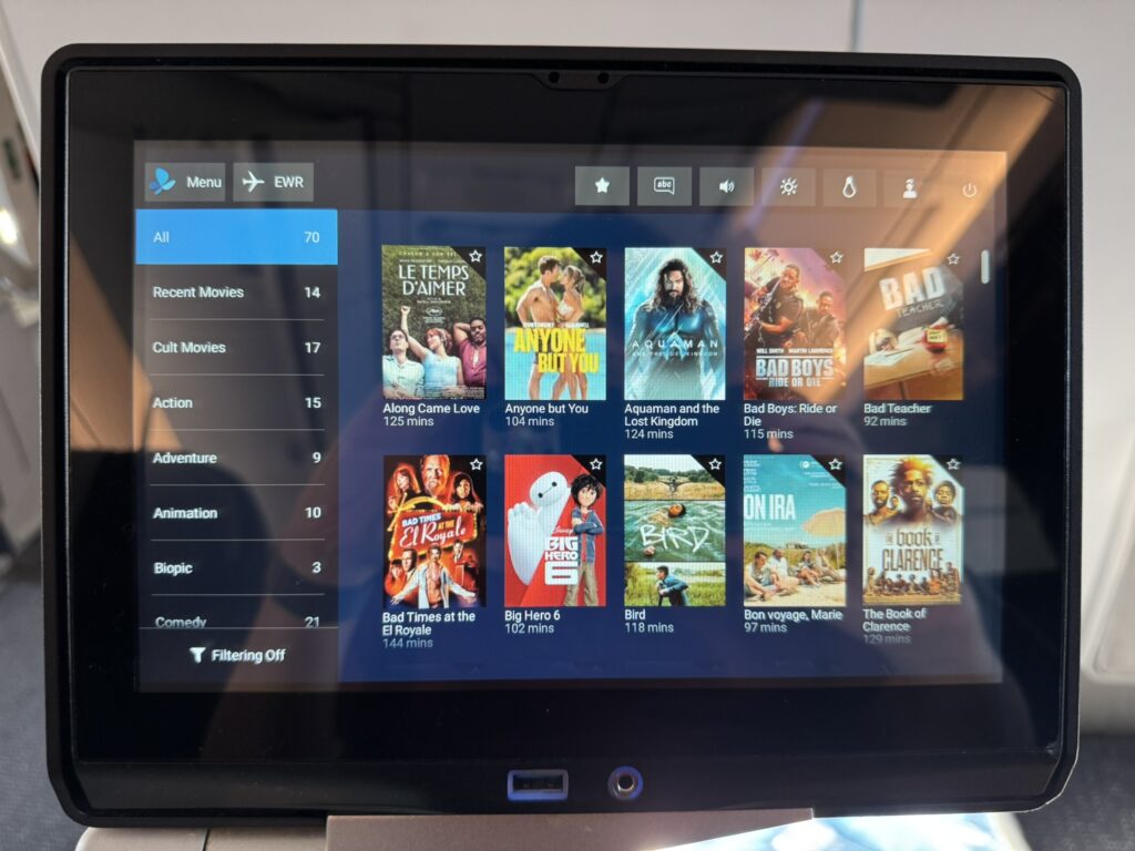 A screen on the IFE showing a selection of content. 