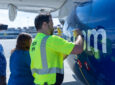 JetBlue employees sign the aircraft