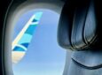 JetBlue wingtip as seen through cabin window